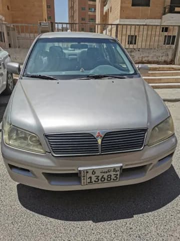 ميتسوبيشي لانسر 1.3L Automatic 2002 مستعملة ميتسوبيشي لانسر 1.3L Automatic 2002 مستعملة used_cars.forSale